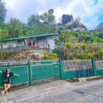 Neri Naig in front of her house in Baguio